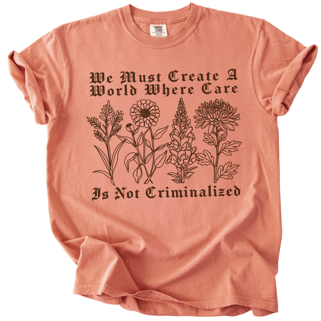 We Must Create A World Where Care is Not Criminalized Tee